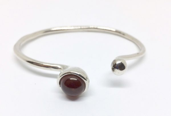 Silver spot bangle with spessartite or kyanite