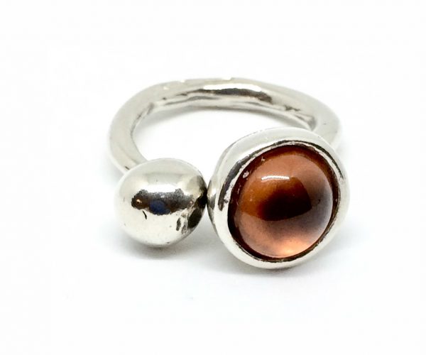 silver spot ring with spessartite or kyanite